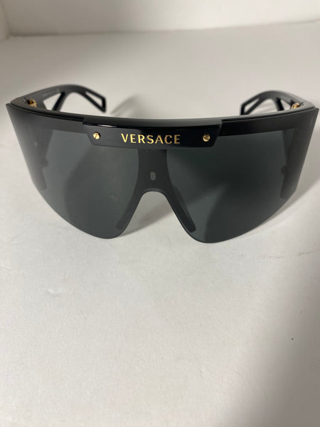 Versace oversized shield black gold sunglasses.