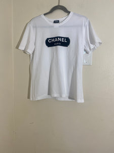 Chanel Uniform
White T Shirt Size Large