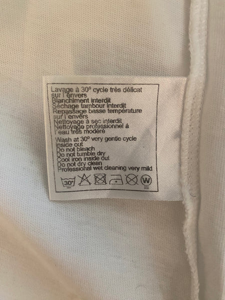 Chanel Uniform
White T Shirt Size Large