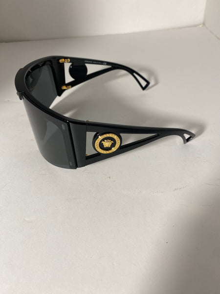 Versace oversized shield black gold sunglasses.