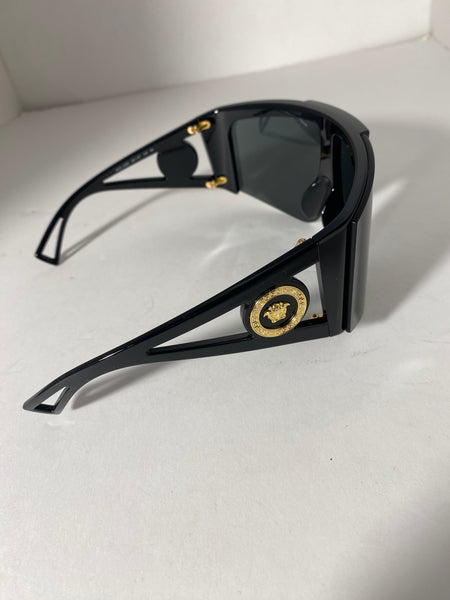 Versace oversized shield black gold sunglasses.