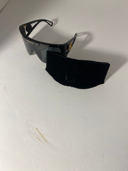 Versace oversized shield black gold sunglasses.