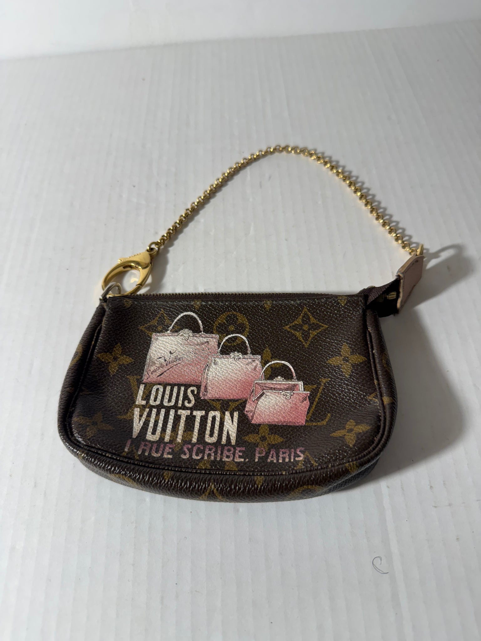 Louis Vuitton
Rue Scribe mini Pouchette