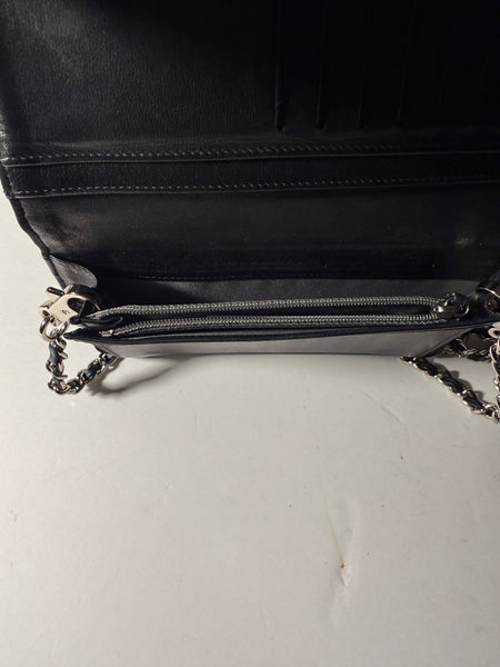 CHANEL Camellia Black
Embossed Wallet