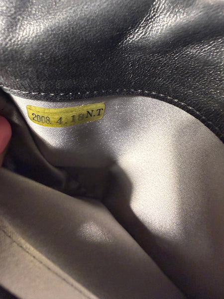 CHANEL Camellia Black
Embossed Wallet