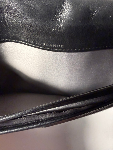 CHANEL Camellia Black
Embossed Wallet
