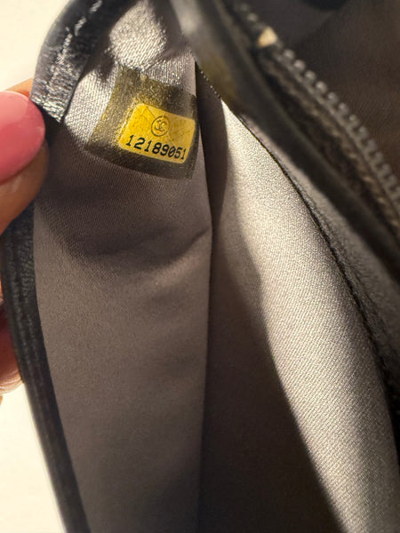 CHANEL Camellia Black
Embossed Wallet