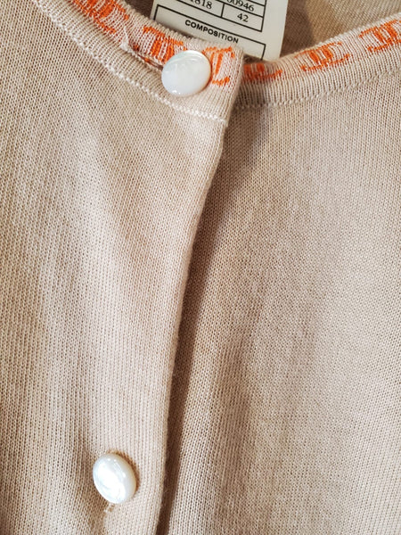 CHANEL Cashmere twinset with CC buttons.