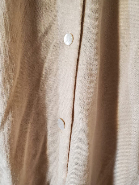 CHANEL Cashmere twinset with CC buttons.